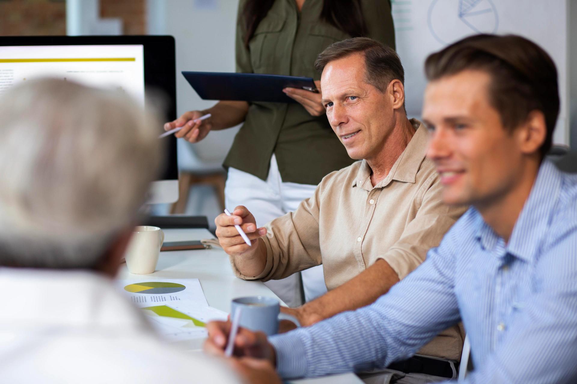 IT consultant meeting with client in conference room
